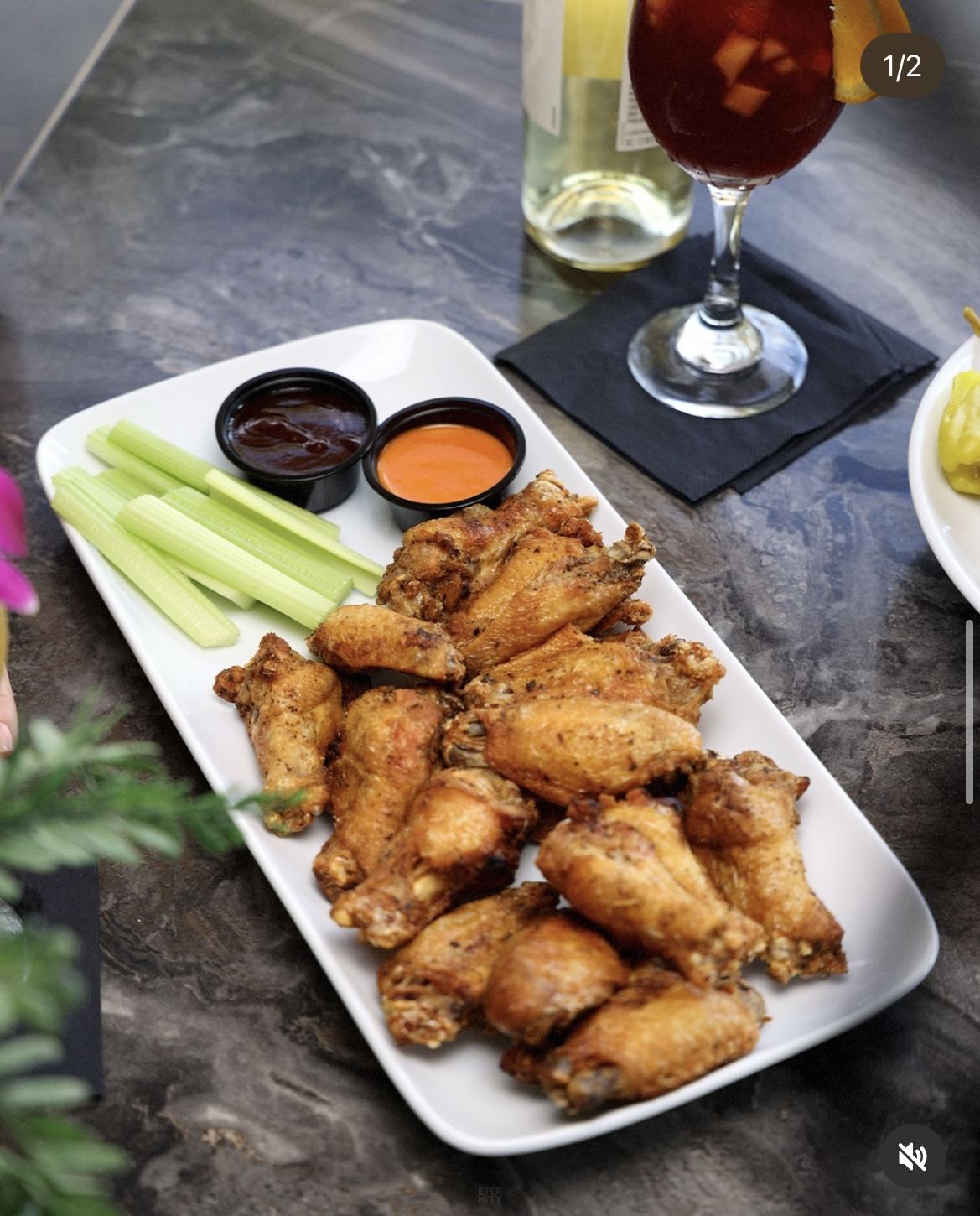 Jumbo wings with celery and dipping sauces